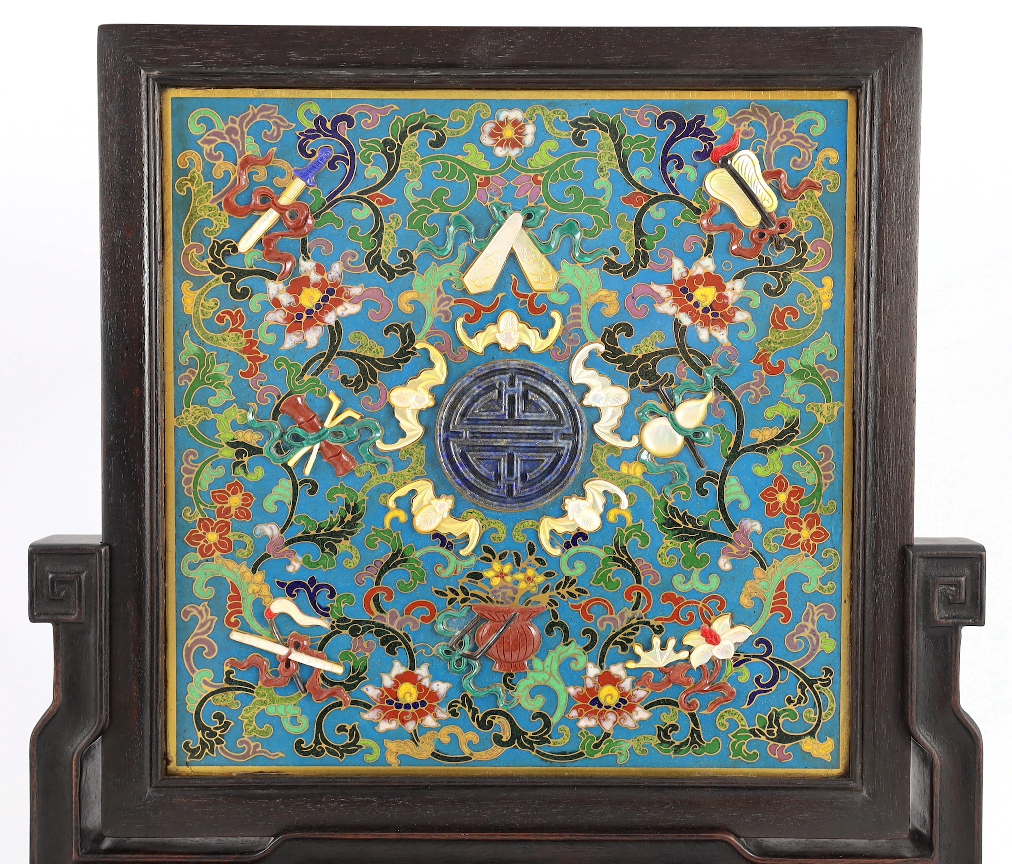 A Chinese cloisonné enamel, hardstone and mother-of-pearl mounted table screen, 42cm high 37cm wide, one foot lacking